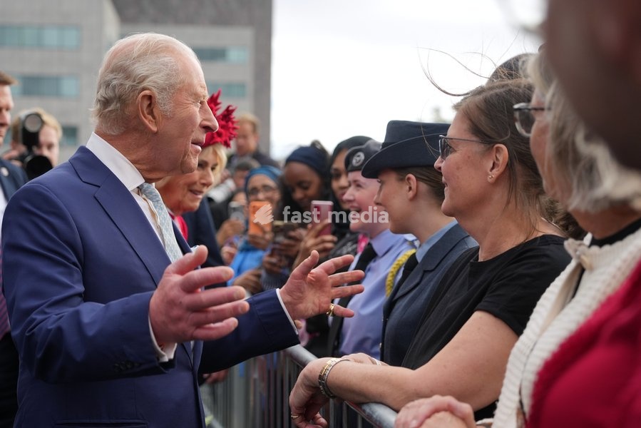 Britain's King Charles III and Queen Camilla meet members of the public after attending the Ceremonial Opening of the Seventh Senedd in Cardiff, Wales, Thursday, Oct. 15, 2026