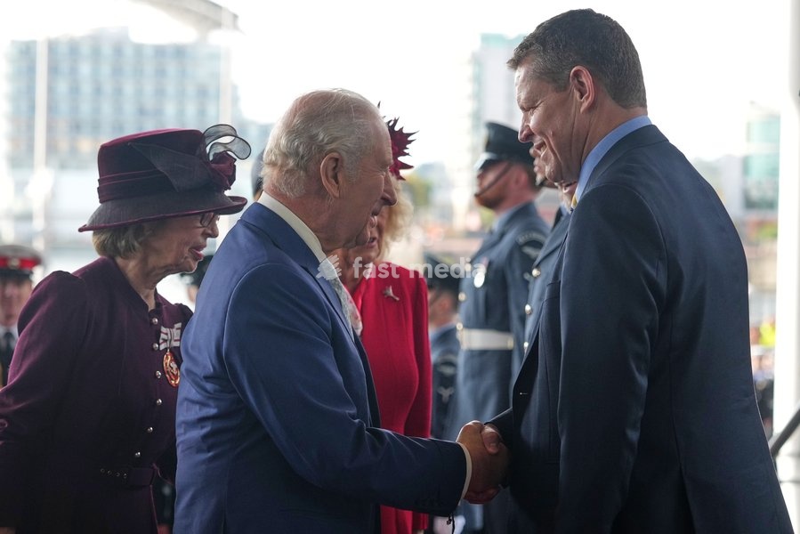 Britain's King Charles III and Queen Camilla is welcomed by Wals' First Minister Rhun ap Iorwerth before they attend the Ceremonial Opening of the Seventh Senedd in Cardiff, Wales, Thursday, Oct. 15, 2026