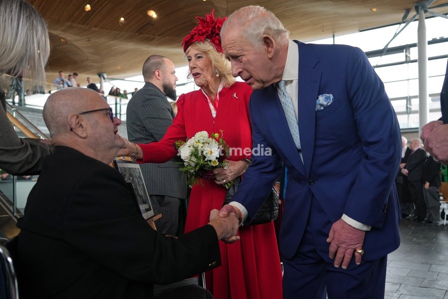 Britain's King Charles III and Queen Camilla meet Gareth Jones, who survived the Aberfan disaster, after the Ceremonial Opening of the Seventh Senedd in Cardiff, Wales, Thursday, Oct. 15, 2026