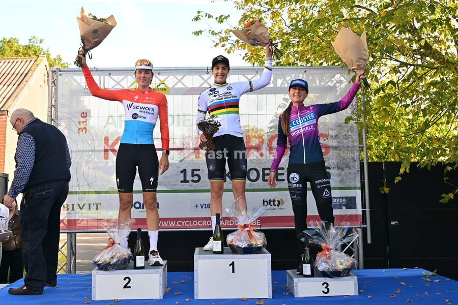 Luxembourg's Marie Schreiber; Netherlands' Lucinda Brand and Netherlands' Denise Betsema celebrate on the podium after the women elite race of the 'Kermiscross' cyclocross cycling event, on Thursday 15 October 2026, in Ardooie