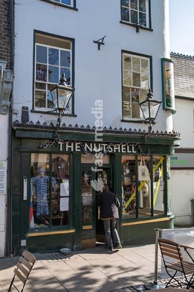 With a bar that measures just 15ft by 7ft, The Nutshell public house, proudly holds the title of smallest pub in Britain as confirmed in the Guinness Book of Records. Bury St Edmunds, Suffolk. United Kingdom. 14 October 2026