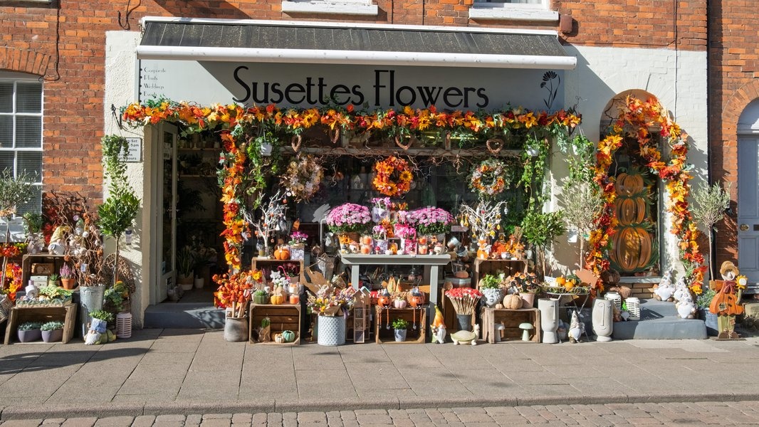 Independent shops along the cobbled road of St John Street. Bury St Edmunds, Suffolk. United Kingdom. 14 October 2026