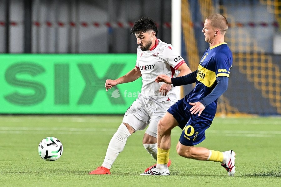Iberia's Zviad Natchkebia and STVV's Robert-Jan Vanwesemael pictured in action during a soccer game between Belgian Sint-Truidense VV and Georgian FC Iberia 1999 Tbilisi, Thursday 15 October 2026 in Sint-Truiden, the opening match of the UEFA Conference League league phase