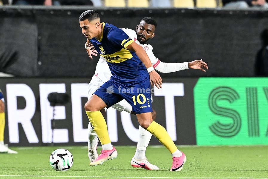 Iberia's Lucas Cafe and STVV's Ilias Sebaoui pictured in action during a soccer game between Belgian Sint-Truidense VV and Georgian FC Iberia 1999 Tbilisi, Thursday 15 October 2026 in Sint-Truiden, the opening match of the UEFA Conference League league phase