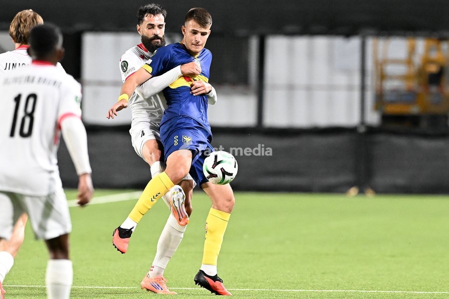 Iberia's Vahid Selimovic and STVV's Samed Bazdar pictured in action during a soccer game between Belgian Sint-Truidense VV and Georgian FC Iberia 1999 Tbilisi, Thursday 15 October 2026 in Sint-Truiden, the opening match of the UEFA Conference League league phase