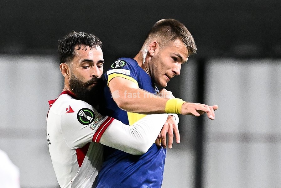 Iberia's Vahid Selimovic and STVV's Samed Bazdar pictured in action during a soccer game between Belgian Sint-Truidense VV and Georgian FC Iberia 1999 Tbilisi, Thursday 15 October 2026 in Sint-Truiden, the opening match of the UEFA Conference League league phase
