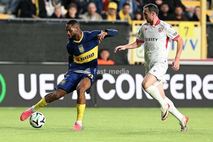 STVV's Abdoulaye Sissako and Iberia's Bakar Kardava pictured in action during a soccer game between Belgian Sint-Truidense VV and Georgian FC Iberia 1999 Tbilisi, Thursday 15 October 2026 in Sint-Truiden, the opening match of the UEFA Conference League league phase