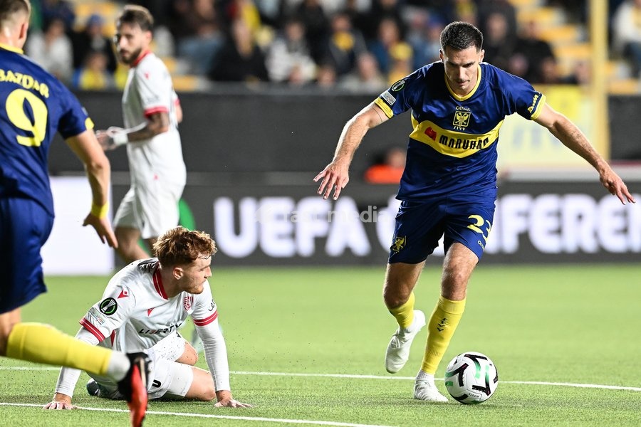 Iberia's Phillip Cančar and STVV's Joedrick Pupe pictured in action during a soccer game between Belgian Sint-Truidense VV and Georgian FC Iberia 1999 Tbilisi, Thursday 15 October 2026 in Sint-Truiden, the opening match of the UEFA Conference League league phase