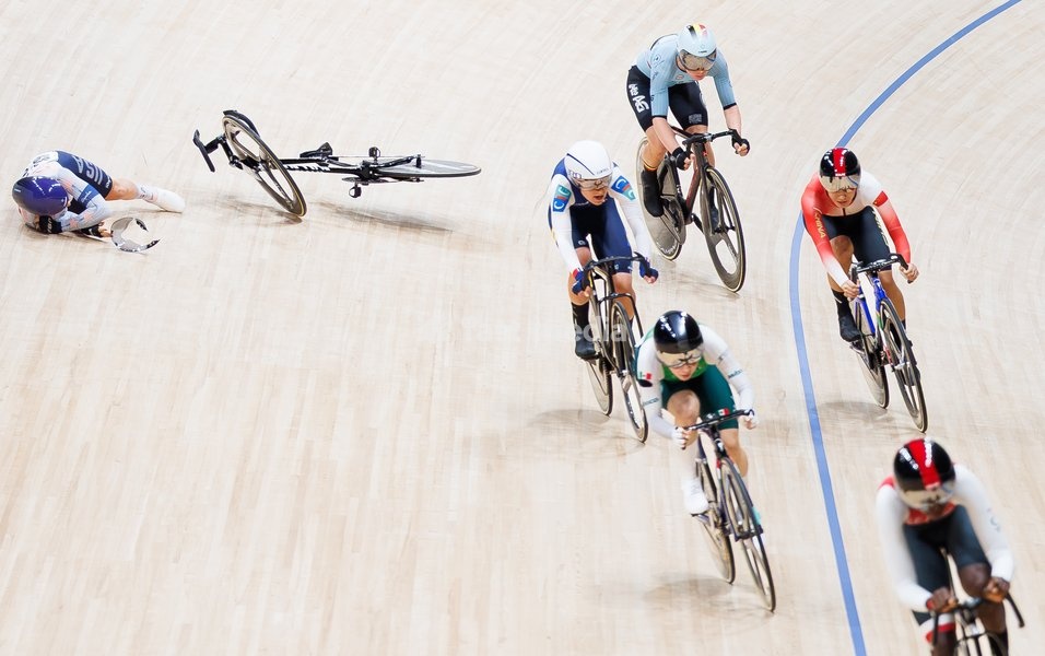 Belgian Lotte Kopecky (back R) rides past several cyclists who fell during the Scratch race of the Women's Omnium event at the UCI Track Cycling World Championships in Shanghai, China on Friday 16 October 2026. The worlds are taking place from 14 to 18 October 2026