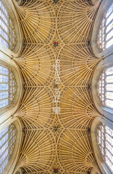 Spectacular fan vaulting ceiling of Bath Abbey showing intricate Perpendicular Gothic stonework and ribbed arches, Somerset, England, UK