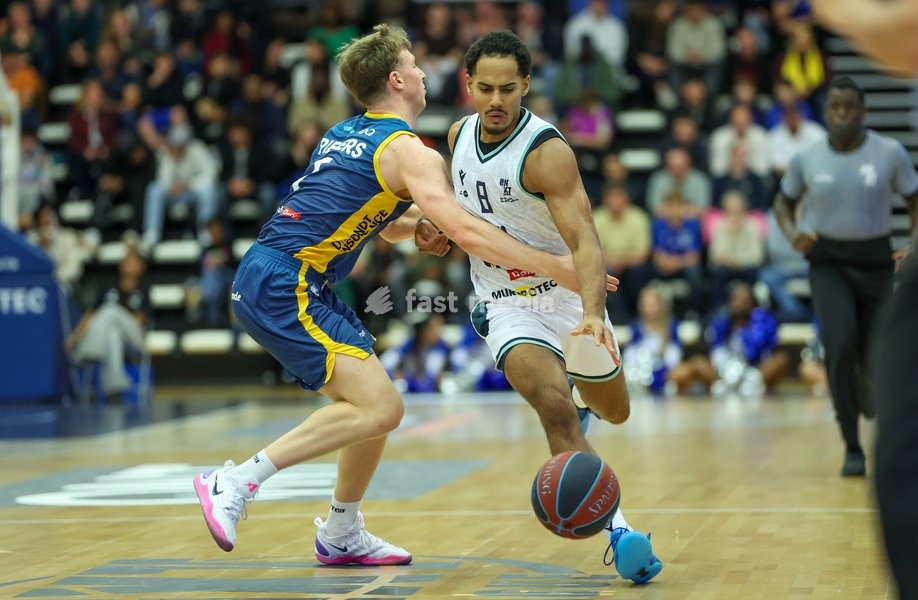 Brussels' Patrick Tape and Oostende's Moussa Sylla fight for the ball during a basketball match between Brussels and Oostende, Friday 16 October 2026 in Brussels, on day 3 of the 'BNXT League' Belgian and Dutch first division basket championship
