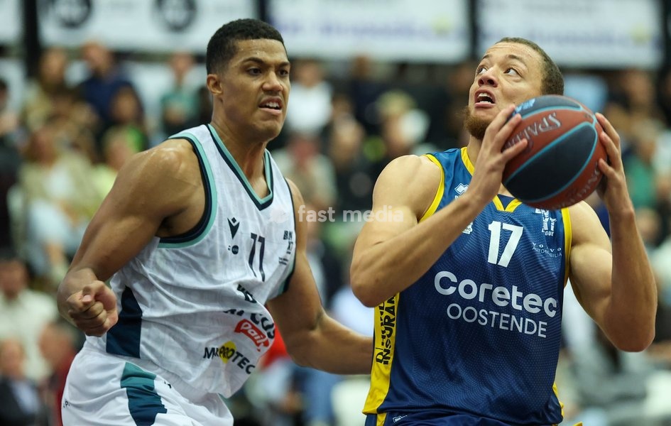 Brussels' Patrick Tape and Oostende's Moussa Sylla fight for the ball during a basketball match between Brussels and Oostende, Friday 16 October 2026 in Brussels, on day 3 of the 'BNXT League' Belgian and Dutch first division basket championship