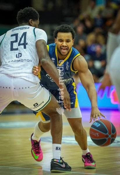 Brussels' Godwin Tshimanga and Oostende's Stephan Swenson fight for the ball during a basketball match between Brussels and Oostende, Friday 16 October 2026 in Brussels, on day 3 of the 'BNXT League' Belgian and Dutch first division basket championship