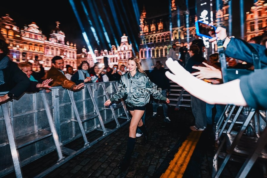 Belgian singer Angèle pictured during the "Angele Instinct Release Party", a surprise party organized by the Brussels singer to celebrate the release of her album "Instinct" at the Grote Markt/ Grand Place, in Brussels, Friday 16 October 2026