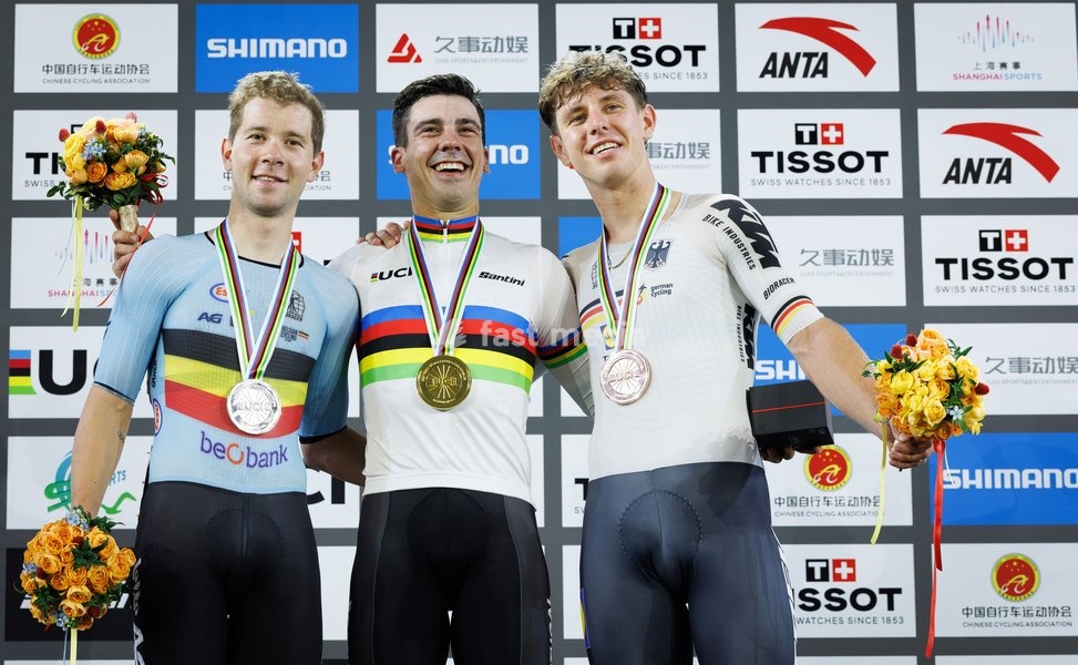 Belgian Fabio Van den Bossche winner of the silver medal, German Tim Torn Teutenberg winner of the bronze medal celebrate on podium after the Men's omnium event at the UCI Track Cycling World Championships in Shanghai, China on Saturday 17 October 2026. The worlds are taking place from 14 to 18…