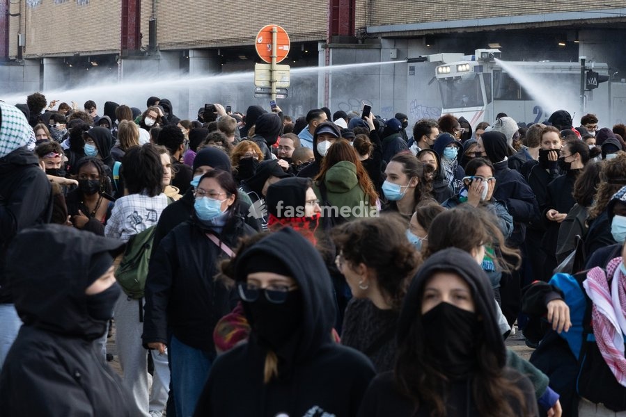 This image shows a riot control water canon pictured in action during youths gather for a protest action in Brussels on Saturday 17 October 2026