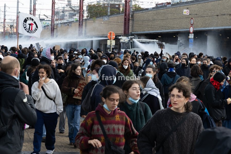 This image shows a riot control water canon pictured in action during youths gather for a protest action in Brussels on Saturday 17 October 2026