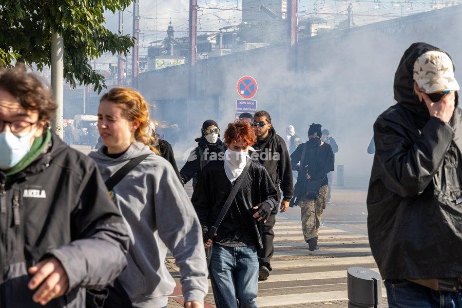 Protesters running away from police tear gas during youths gather for a protest action in Brussels on Saturday 17 October 2026