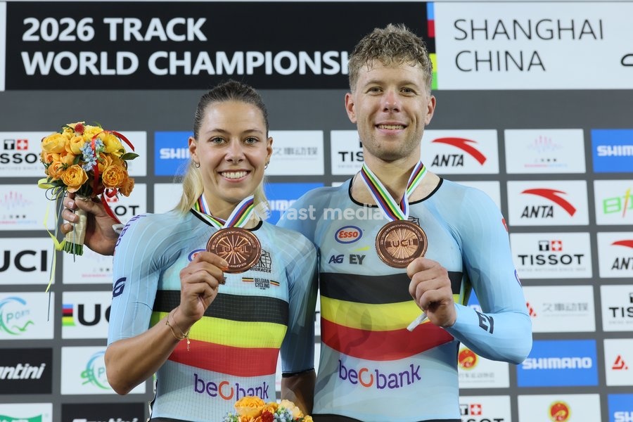 Belgians Shari Bossuyt and Jules Hesters celebrate on the podium with their bronze medals at the UCI Track Cycling World Championships in Shanghai, China on Sunday 18 October 2026. The worlds are taking place from 14 to 18 October 2026