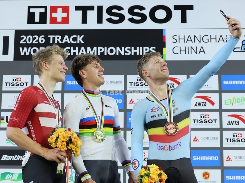 Danish Tobias Hansen, German Tim Torn Teutenberg and Belgian Jules Hesters celebrate on the podium of the UCI Track Cycling World Championships in Shanghai, China on Sunday 18 October 2026. The worlds are taking place from 14 to 18 October 2026