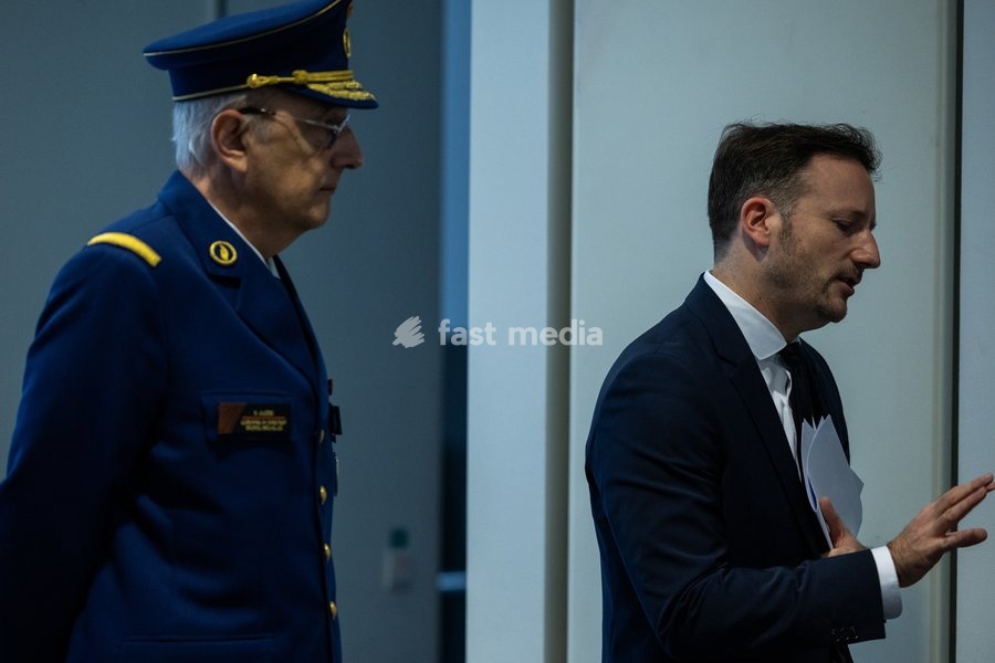 Brussels Judicial Police director of operations, Eric Jacobs; Brussels' King's Prosecutor Julien Moinil and +pictured during a press conference of the Federal Prosecutor and the federal police, regarding the fatal shooting of a police officer, on Sunday 18 October 2026 in Brussels. 41-year-old…