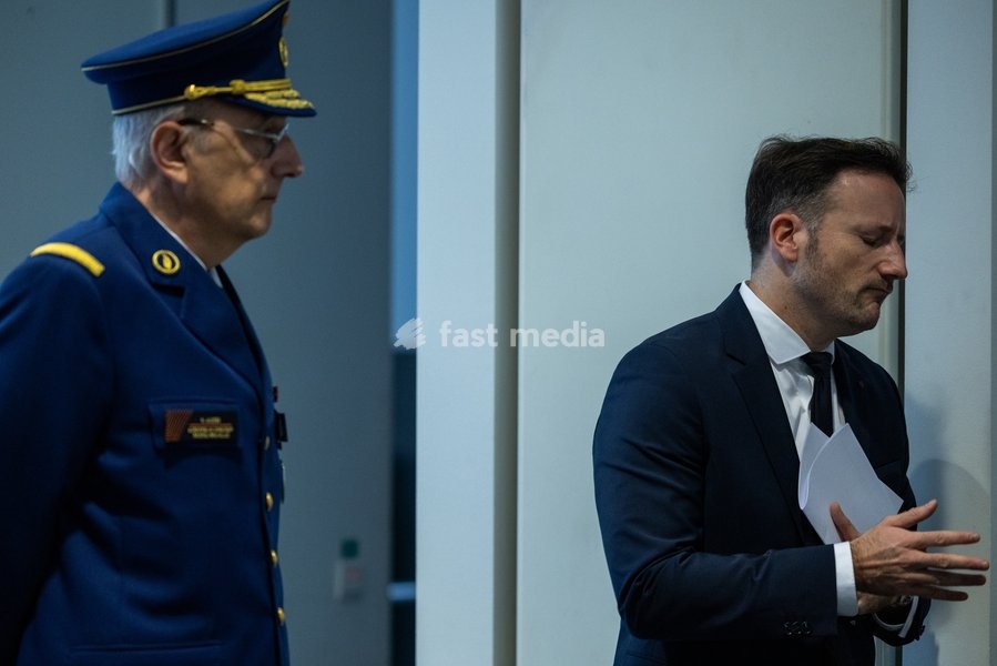 Brussels Judicial Police director of operations, Eric Jacobs; Brussels' King's Prosecutor Julien Moinil and +pictured during a press conference of the Federal Prosecutor and the federal police, regarding the fatal shooting of a police officer, on Sunday 18 October 2026 in Brussels. 41-year-old…