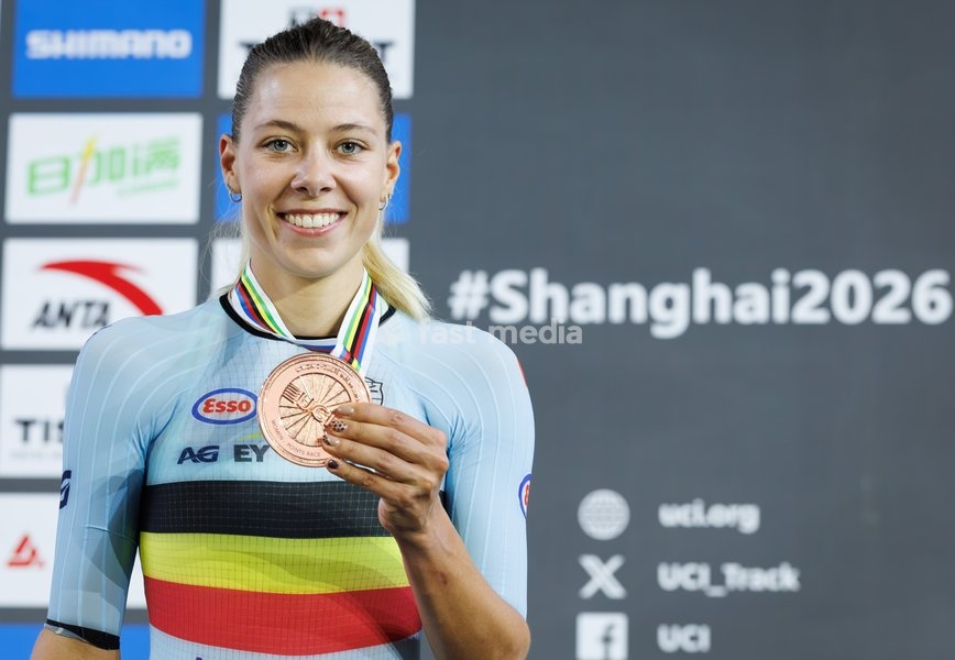 Belgian Shari Bossuyt, winner of the bronze medal, celebrates on the podium of the Women’s Points Race event at the UCI Track Cycling World Championships in Shanghai, China on Sunday 18 October 2026. The worlds are taking place from 14 to 18 October 2026