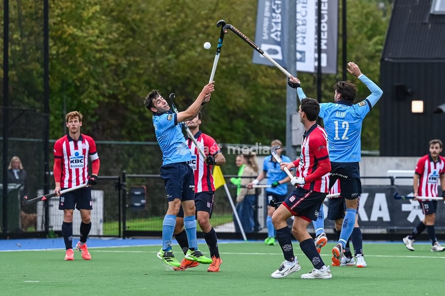 Braxgata's Thibeaut Stockbroekx and Braxgata's Marc Reyne fight for the ball during a hockey game between Braxgata and Leopold, Sunday 18 October 2026 in Boom, on day 6 of the Belgian first division hockey championship