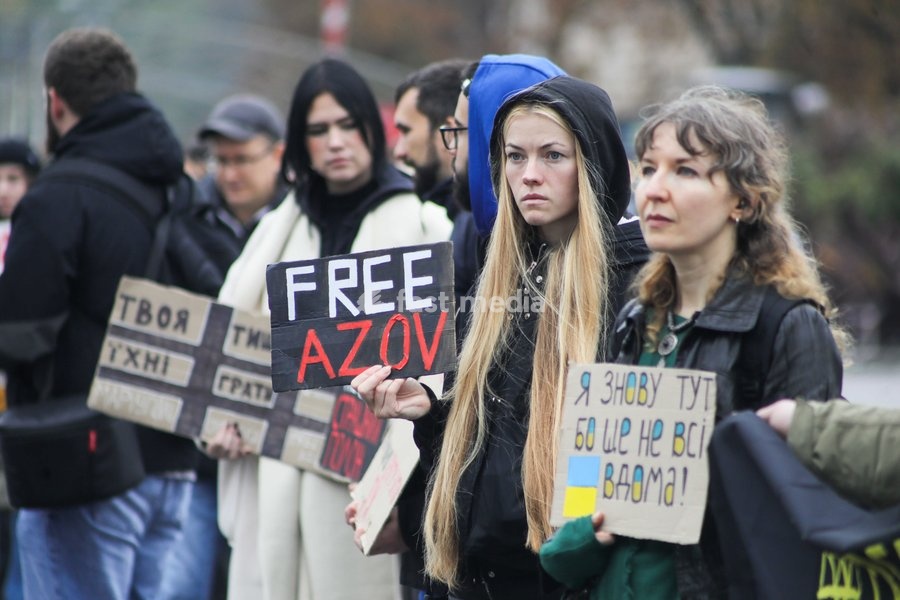 A demonstrator holds a placard reading "Free Azov" in Maidan Nezalezhnosti (Independence Square) during the weekly “Don’t Stay Silent! Captivity Kills” rally in support of Ukrainian military personnel held in Russian captivity or listed as missing in action, Kyiv, Ukraine, October 18, 2026
