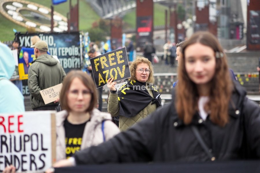A demonstrator holds a placard reading "Free Azov" in Maidan Nezalezhnosti (Independence Square) during the weekly “Don’t Stay Silent! Captivity Kills” rally in support of Ukrainian military personnel held in Russian captivity or listed as missing in action, Kyiv, Ukraine, October 18, 2026