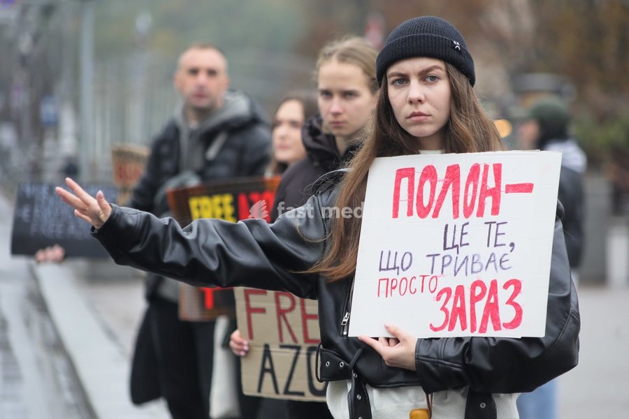 A demonstrator holds a placard reading "Captivity Is What’s Happening Right Now" in Maidan Nezalezhnosti (Independence Square) during the weekly “Don’t Stay Silent! Captivity Kills” rally in support of Ukrainian military personnel held in Russian captivity or listed as missing in action, Kyiv,…