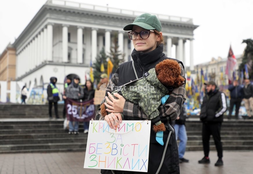 An activist holds a placard reading "We Are Shouting for MIAs" in Maidan Nezalezhnosti (Independence Square) during the weekly “Don’t Stay Silent! Captivity Kills” rally in support of Ukrainian military personnel held in Russian captivity or listed as missing in action, Kyiv, Ukraine, October 18,…
