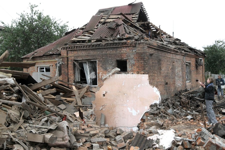 A woman takes pictures of a ruined house with her smartphone after a Russian bombardment in Dnipro, Ukraine, October 19, 2026. On Monday morning, Russian forces launched guided aerial bombs at the eastern city, damaging private homes and infrastructure. An 84-year-old woman was hospitalised in…