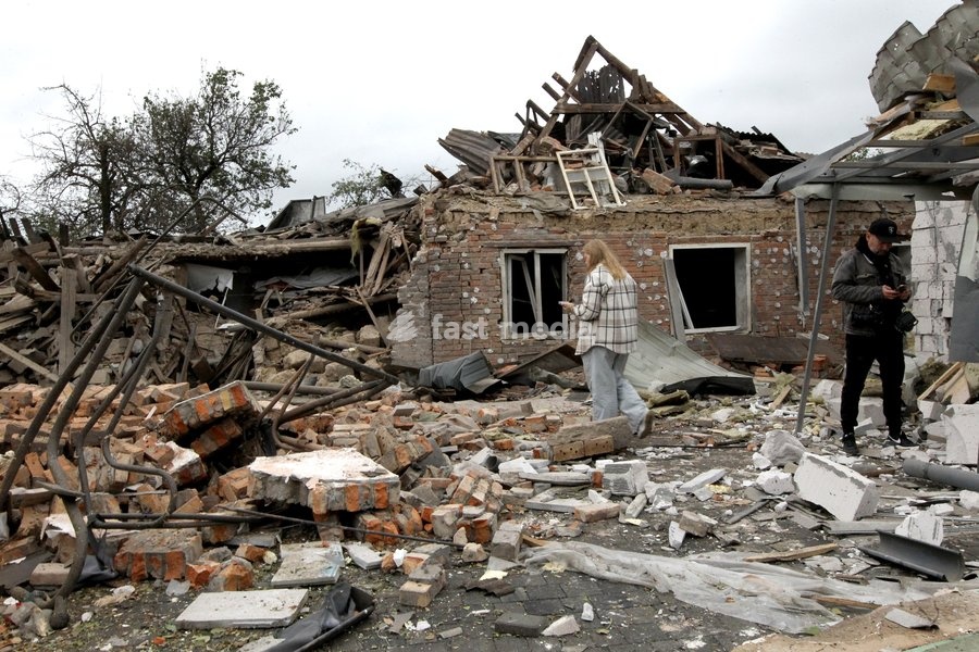 A man and a woman stand among the rubble near a house damaged by a Russian bombardment in Dnipro, Ukraine, October 19, 2026. On Monday morning, Russian forces launched guided aerial bombs at the eastern city, damaging private homes and infrastructure. An 84-year-old woman was hospitalised in…