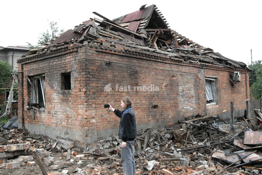 A woman takes pictures of a ruined house with her smartphone after a Russian bombardment in Dnipro, Ukraine, October 19, 2026. On Monday morning, Russian forces launched guided aerial bombs at the eastern city, damaging private homes and infrastructure. An 84-year-old woman was hospitalised in…
