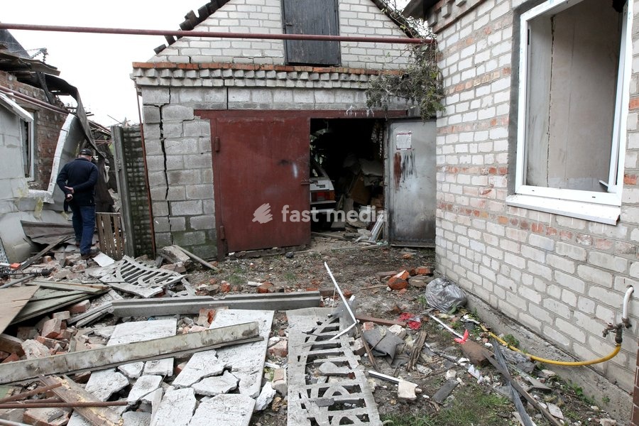 A man walks past a garage damaged by a Russian bombardment in Dnipro, Ukraine, October 19, 2026. On Monday morning, Russian forces launched guided aerial bombs at the eastern city, damaging private homes and infrastructure. An 84-year-old woman was hospitalised in moderate condition