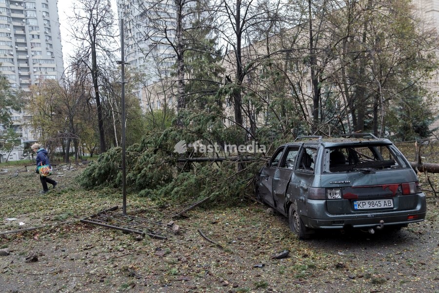 A spruce tree lies on a car in the Solomianskyi district damaged by a Russian attack, Kyiv, Ukraine, October 19, 2026. During the night and morning, Russia launched a massive strike on the capital using ballistic missiles, cruise missiles, and drones. According to Kyiv city head Vitali Klitschko,…