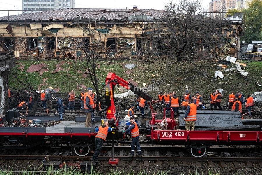 Repair workers restore tracks near the Chernihivska metro station damaged by a Russian strike, Kyiv, Ukraine, October 19, 2026. During the night and morning, Russia launched a massive strike on the capital with ballistic missiles, cruise missiles, and drones. According to the Kyiv City State…