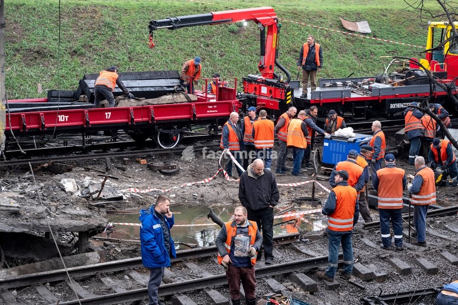 Repair workers restore tracks near the Chernihivska metro station damaged by a Russian strike, Kyiv, Ukraine, October 19, 2026. During the night and morning, Russia launched a massive strike on the capital with ballistic missiles, cruise missiles, and drones. According to the Kyiv City State…