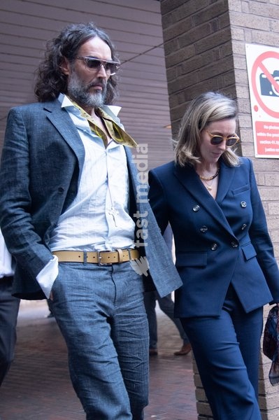 Russell Brand and wife Laura Brand departs Southwark Crown Court in London, England, UK on Monday 19 October, 2026. The actor and comedian is facing seven charges in the trial - three counts of rape, three charges of sexual assault and one of indecent assault