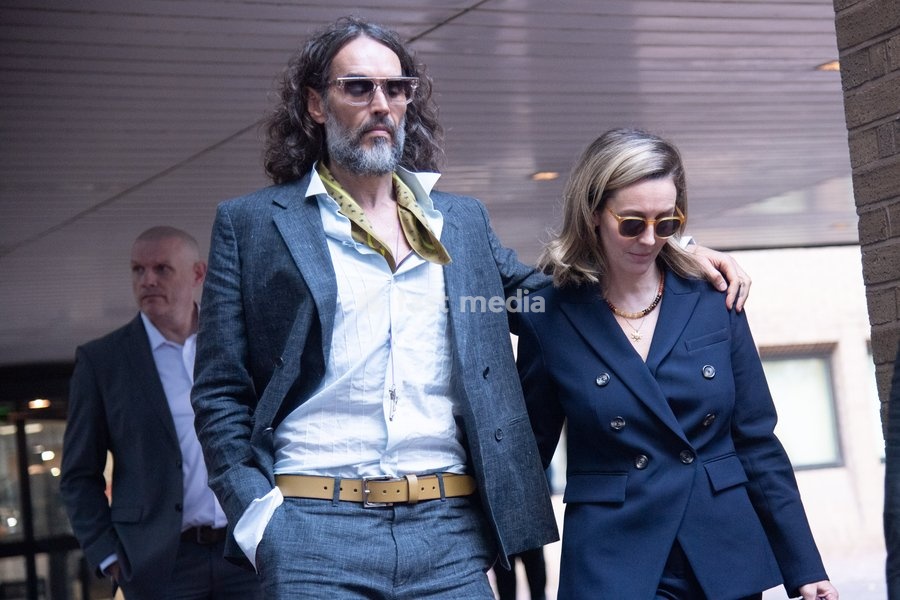 Russell Brand and wife Laura Brand departs Southwark Crown Court in London, England, UK on Monday 19 October, 2026. The actor and comedian is facing seven charges in the trial - three counts of rape, three charges of sexual assault and one of indecent assault