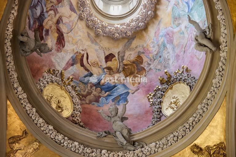 Close-up onto frescos and angel statues inside the Dome of the Church of St. Anne in Krako/Poland