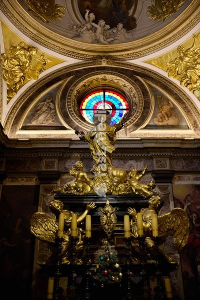 Golden group of sculptures on top of the Tomb of Saint Hyazinth, inside the Hyazinth Chapel , at the Church of the Trinity, Krakow/Poland