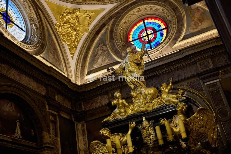 Golden group of sculptures on top of the Tomb of Saint Hyazinth, inside the Hyazinth Chapel , at the Church of the Trinity, Krakow/Poland