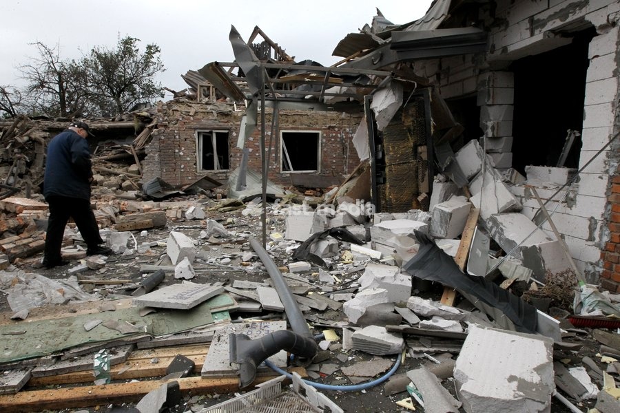 A man stands among the rubble outside a house damaged by a Russian bombardment in Dnipro, Ukraine, October 19, 2026. On Monday morning, Russian forces launched guided aerial bombs at the eastern city, damaging private homes and infrastructure. An 84-year-old woman was hospitalised in moderate…