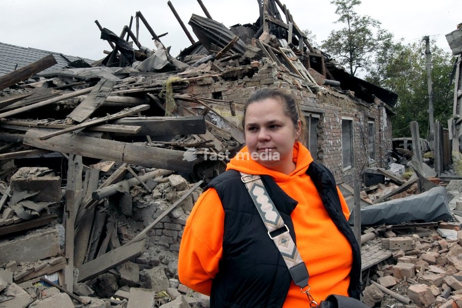 A woman stands among the rubble outside a house damaged by a Russian bombardment in Dnipro, Ukraine, October 19, 2026. On Monday morning, Russian forces launched guided aerial bombs at the eastern city, damaging private homes and infrastructure. An 84-year-old woman was hospitalised in moderate…
