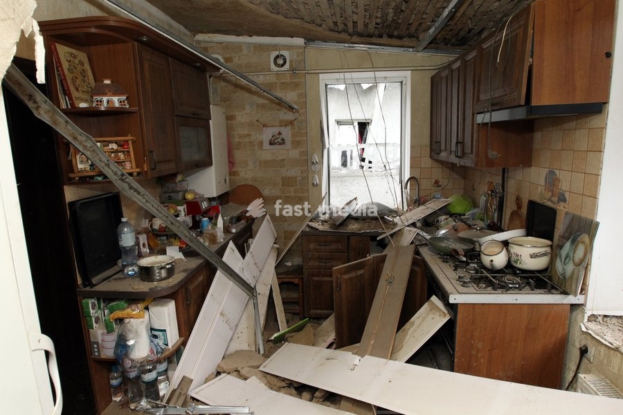 A car is kept in a garage damaged by a Russian bombardment in Dnipro, Ukraine, October 19, 2026. On Monday morning, Russian forces launched guided aerial bombs at the eastern city, damaging private homes and infrastructure. An 84-year-old woman was hospitalised in moderate condition