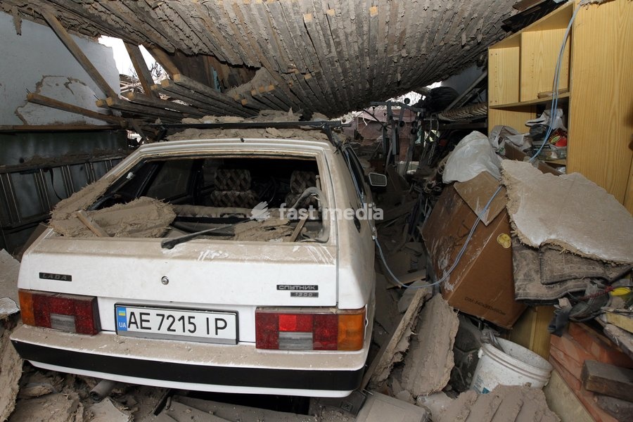 A car is kept in a garage damaged by a Russian bombardment in Dnipro, Ukraine, October 19, 2026. On Monday morning, Russian forces launched guided aerial bombs at the eastern city, damaging private homes and infrastructure. An 84-year-old woman was hospitalised in moderate condition