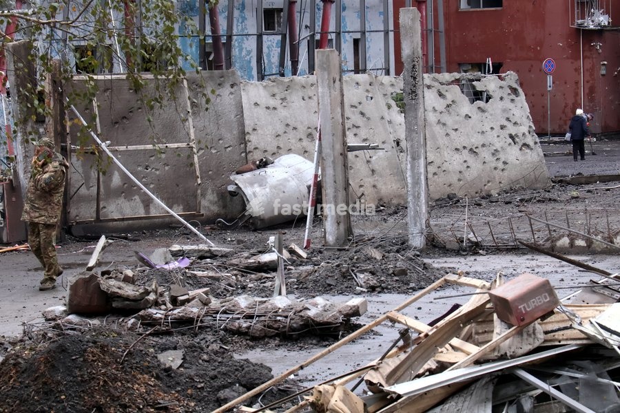 A man in a camouflage uniform talks on the phone among the rubble in the Solomianskyi district after a Russian attack in Kyiv, Ukraine, on October 19, 2026. During the night and morning, Russia launched a massive strike on the capital using ballistic missiles, cruise missiles, and drones. According…