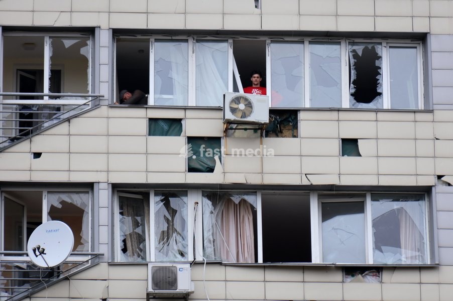 Two men deal with shattered windows in the Solomianskyi district after a Russian attack in Kyiv, Ukraine, on October 19, 2026. During the night and morning, Russia launched a massive strike on the capital using ballistic missiles, cruise missiles, and drones. According to Kyiv city head Vitali…